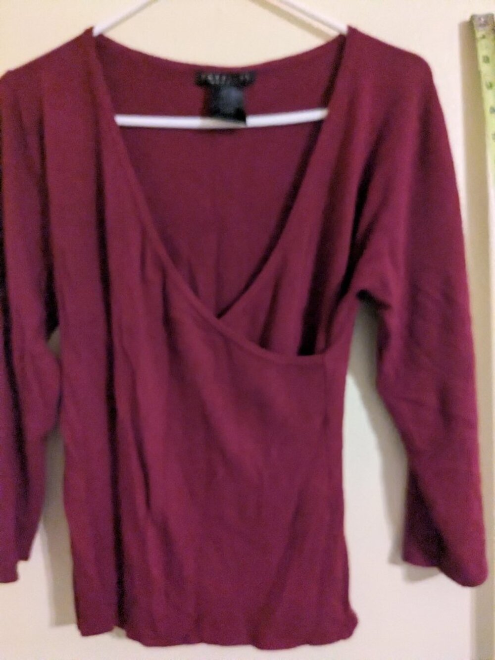 Burgundy wrap sweater.